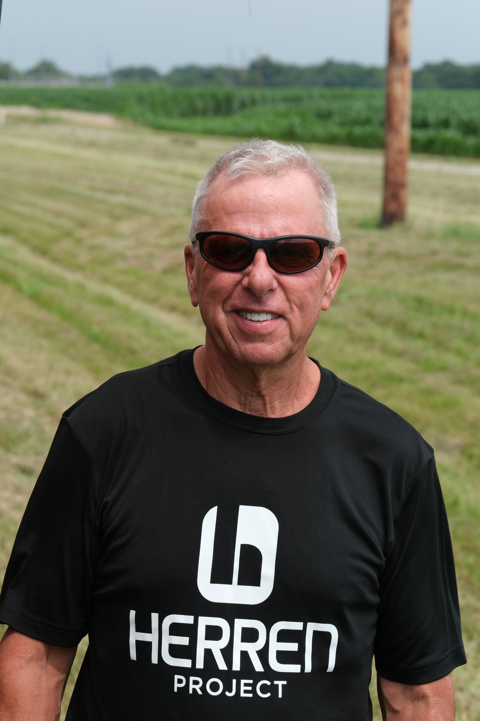 Kevin Murphy in a black Herren Project shirt and sunglasses